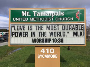 Sign Text: "Love is the most durable power int he world." - Martin Luther King. Worship 10:30am