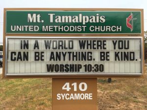 Sign Text: In a world where you can be anything, be kind. Worship 10:30am
